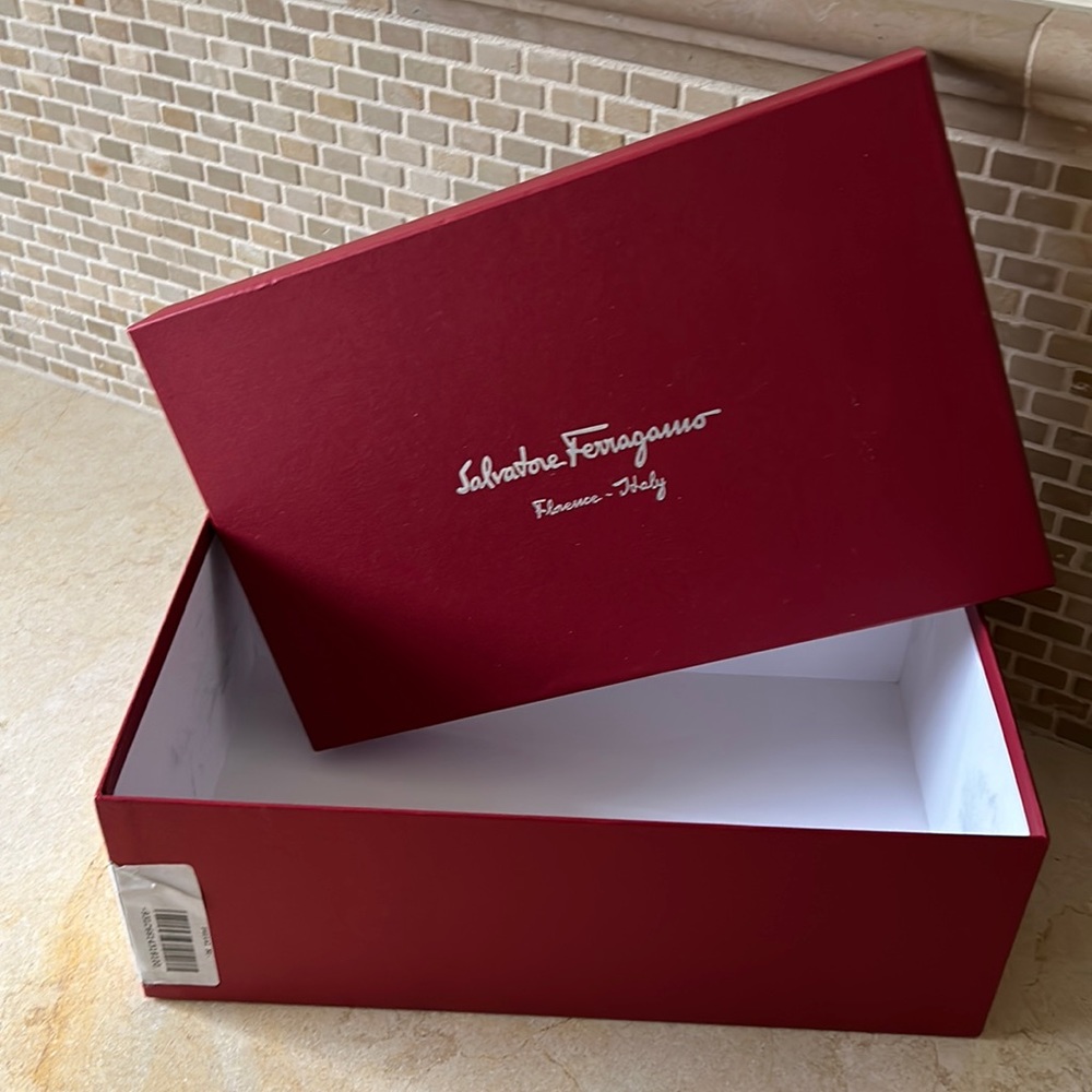 Salvador’s Ferragamo size 10 E shoe box.